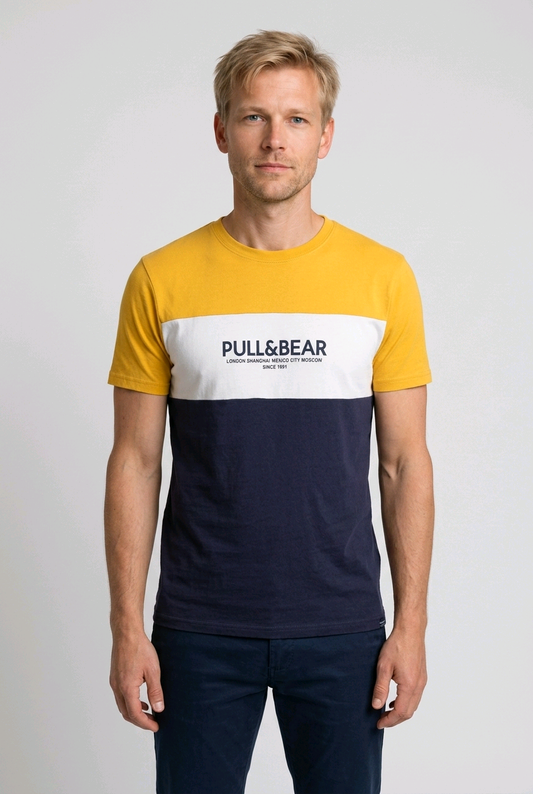 Man wear a mustard and navy pull & bear t shirt
