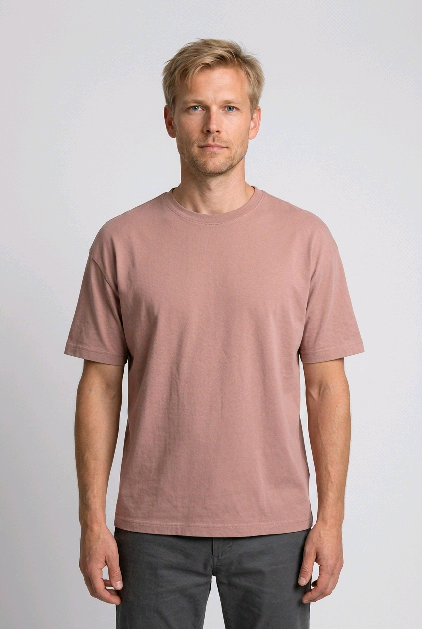 Man wearing a dusty rose t shirt