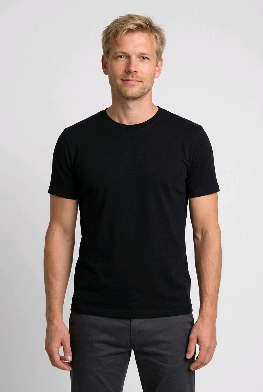 Man wearing a plain black t shirt