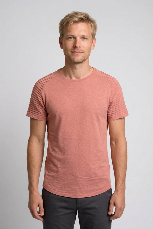 Man wearing a pink t shirt