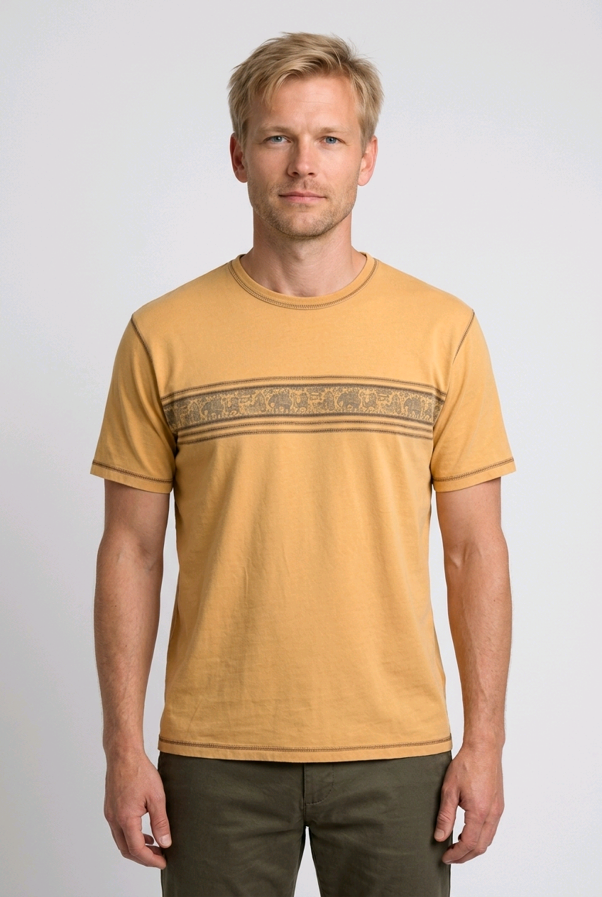 Man wearing a mustard yellow t-shirt with a patterned band 