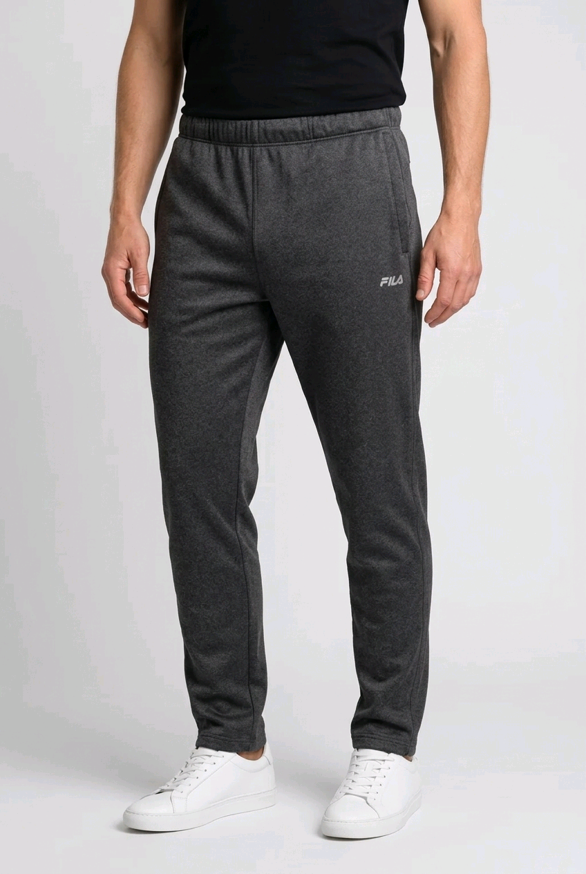 Man wearing a pair of grey Fila joggers