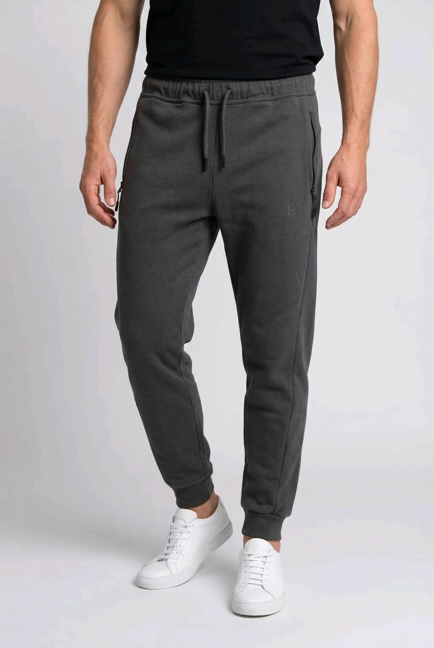 Man wearing a pair of grey joggers