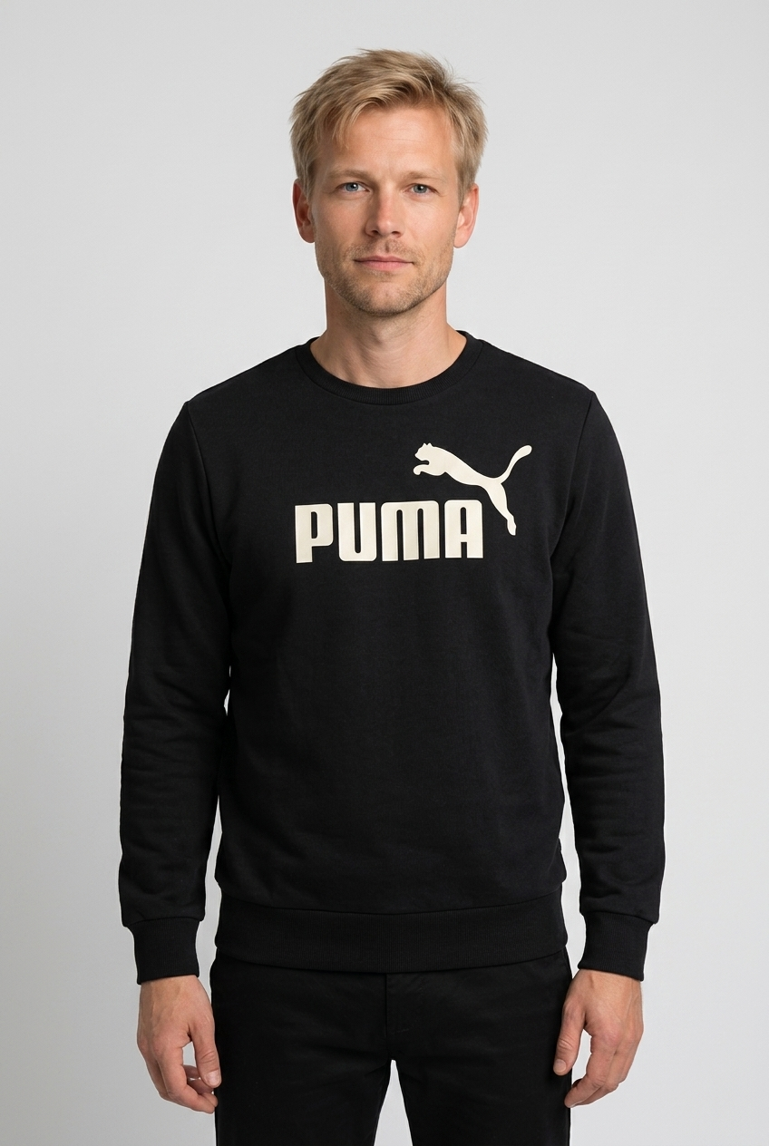 Man wearing a black Puma sweatshirt 