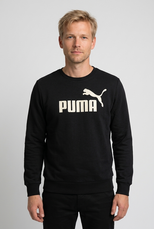 Man wearing a black Puma sweatshirt 