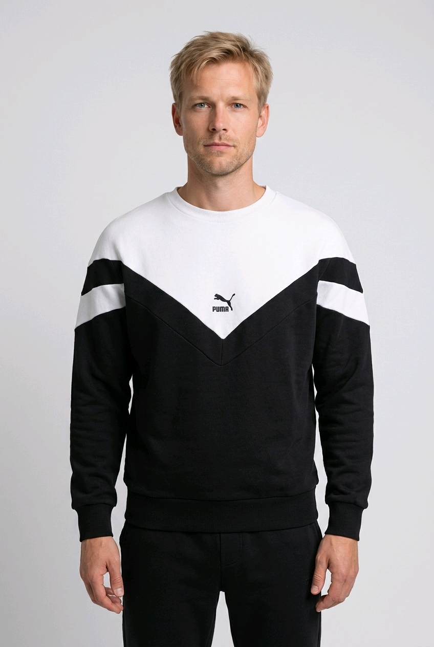 Man wearing PUMA black & white sweatshirt