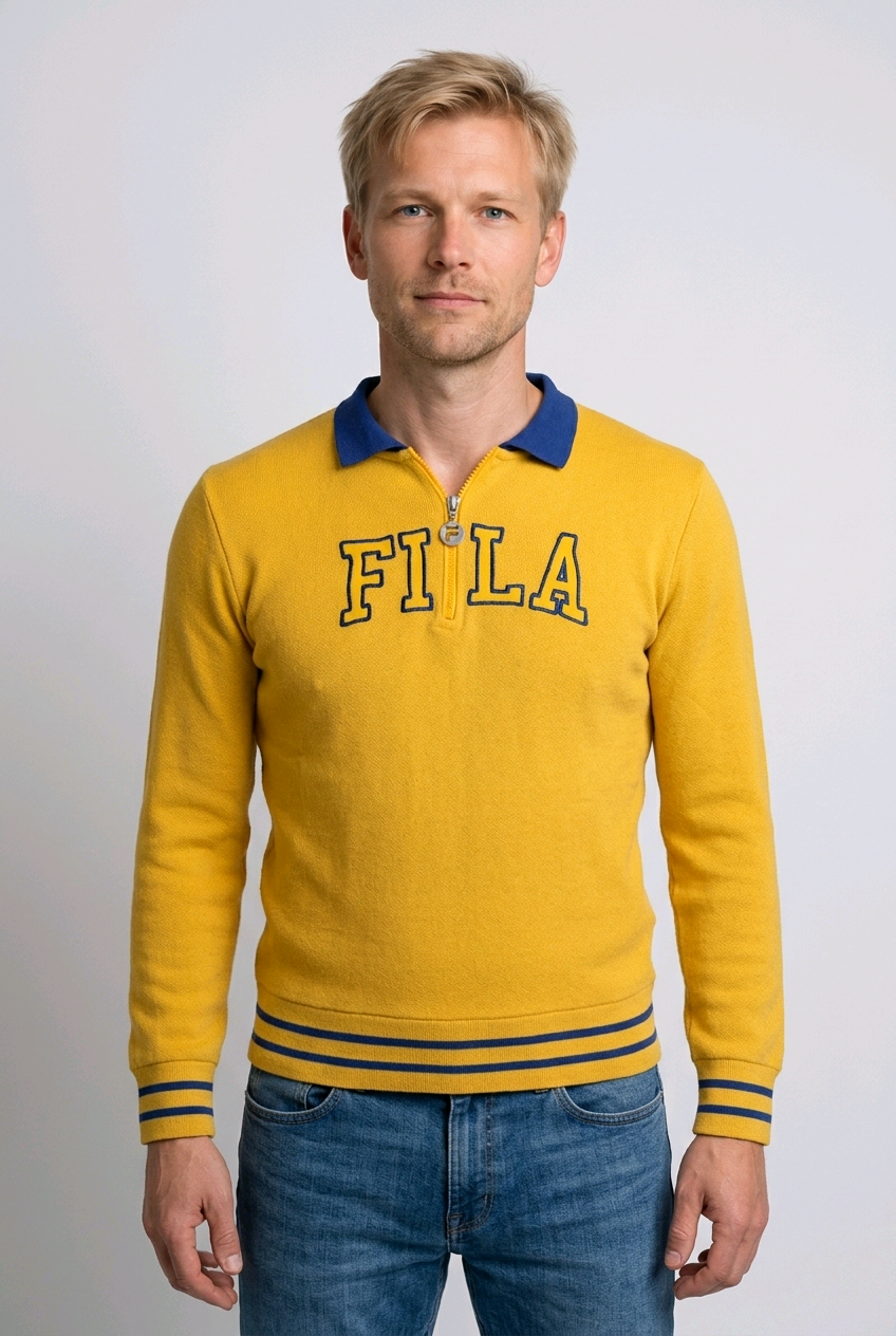 Man wearing a yellow sweater with 'FILA' branding