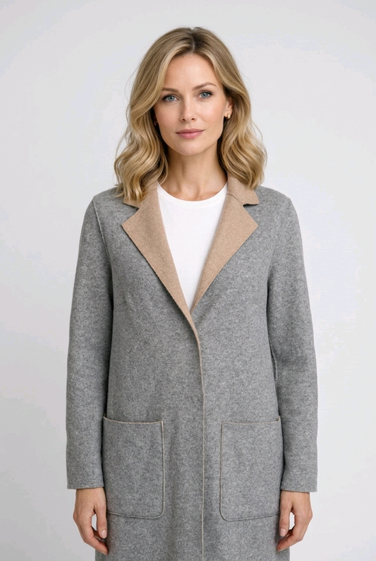 Woman wearing a gray coat with a beige collar 