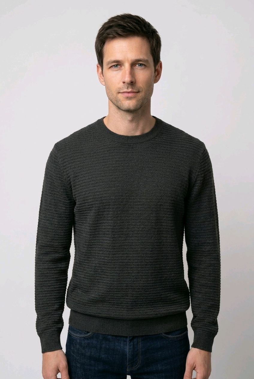 Man wearing a black textured jumper