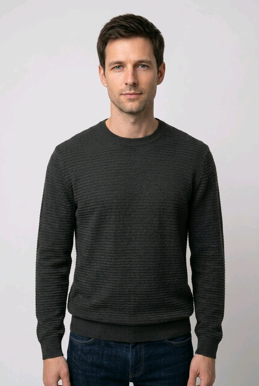 Man wearing a black textured jumper
