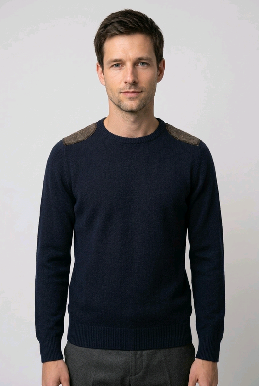 Man wearing a navy elbow patch jumper