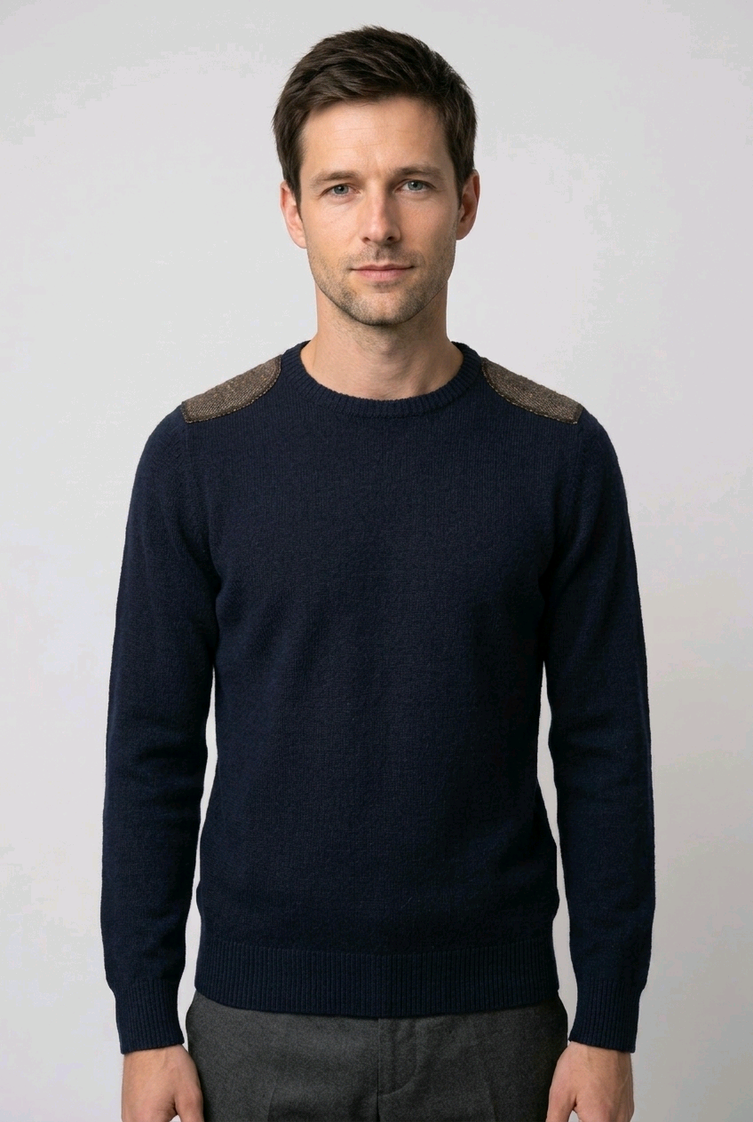 Man wearing a navy elbow patch jumper