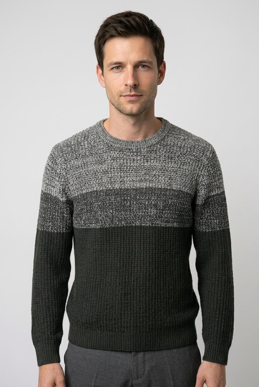 Man wearing a gray and black jumper