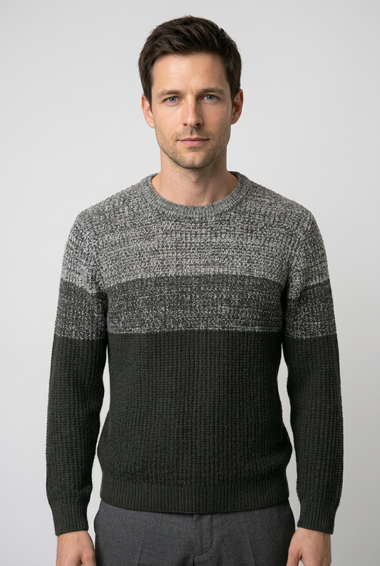 Man wearing a gray and black jumper