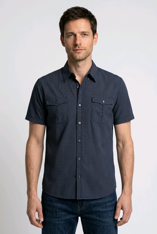 Man wearing a navy short-sleeve shirt 