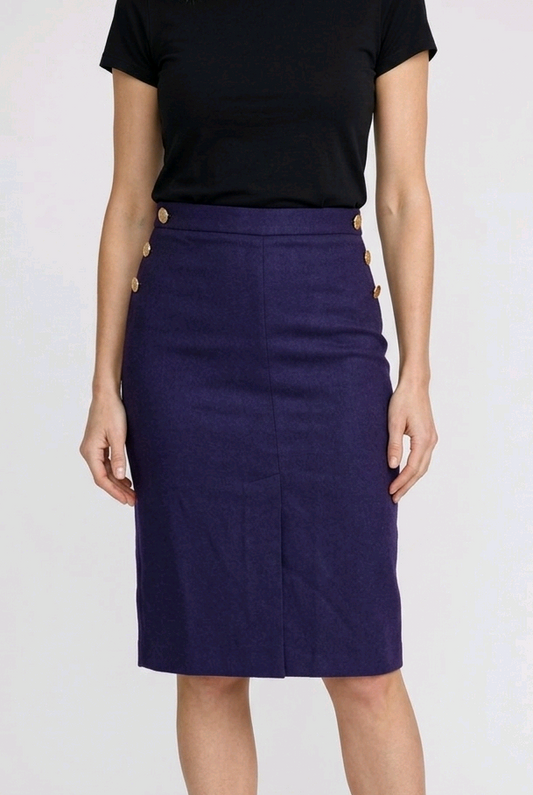 Woman wearing a black top and Blue skirt 