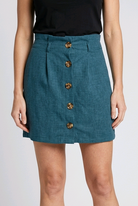 Woman wearing a teal button-up skirt 
