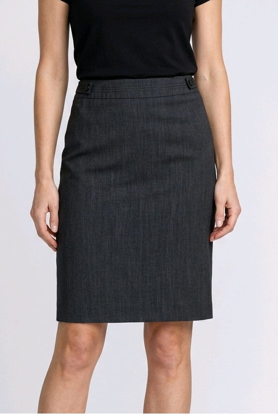 Woman wearing a black skirt and black shoes 