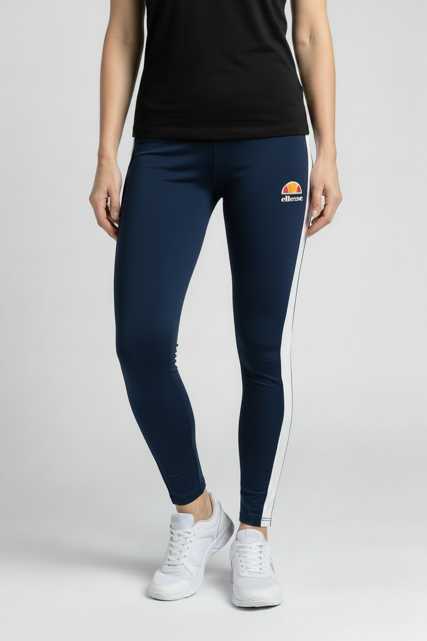 Person wearing navy leggings with a white stripe and a ellesse logo