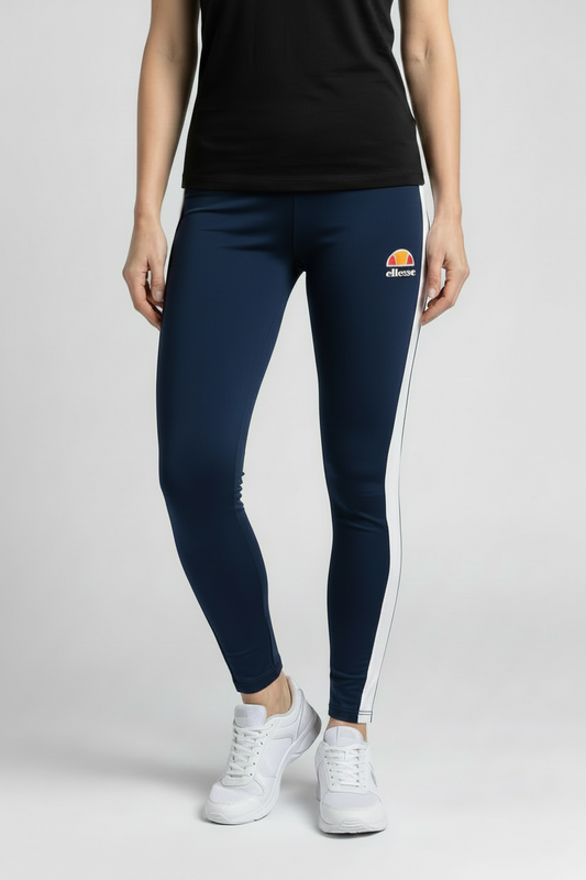 Person wearing navy leggings with a white stripe and a ellesse logo