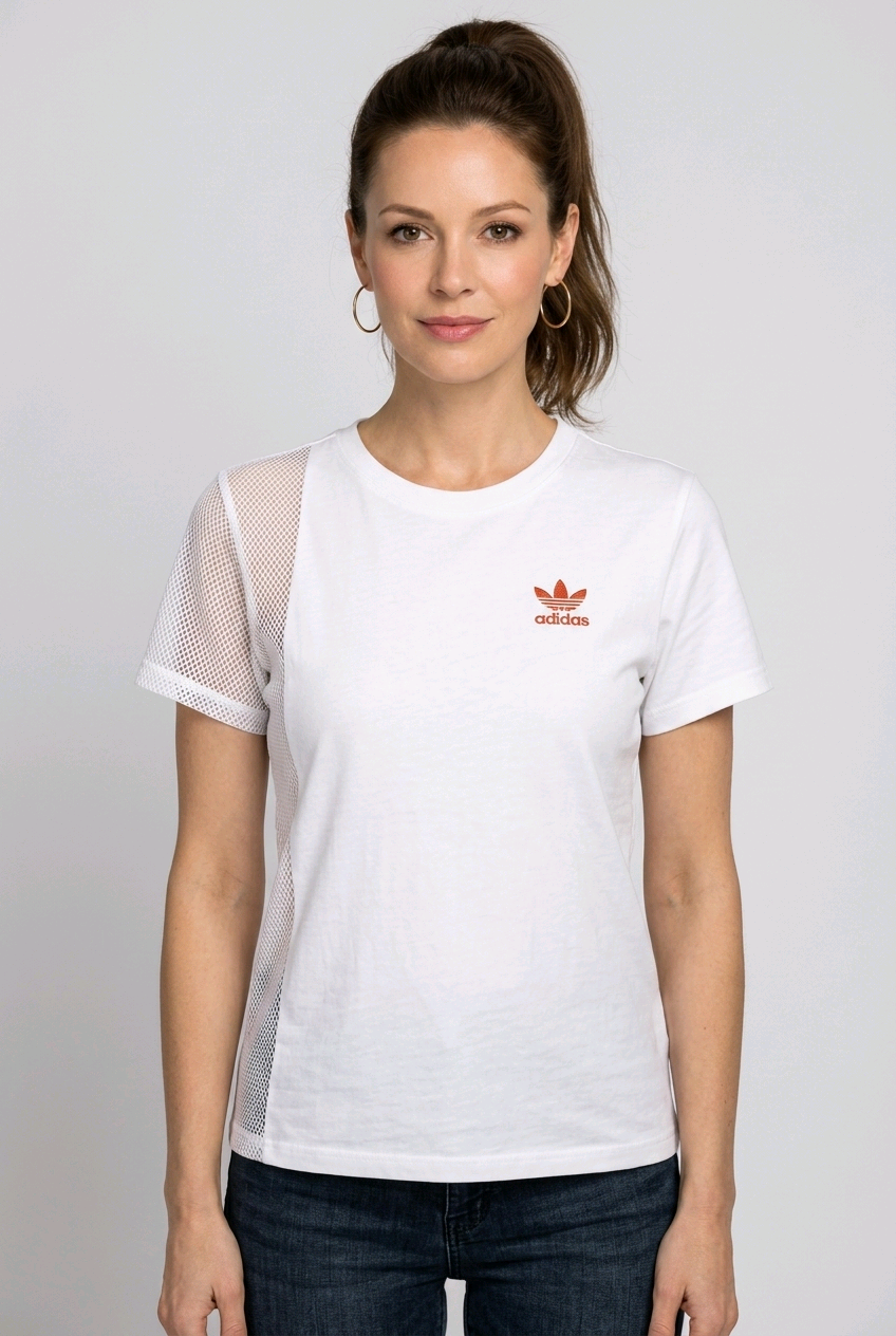 Women wearing a white Adidas t shirt