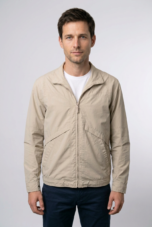 Man wearing beige jacket zip up