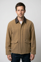 Man wearing brown coat