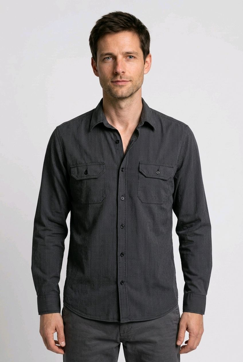 Man wearing a dark gray button-up shirt 
