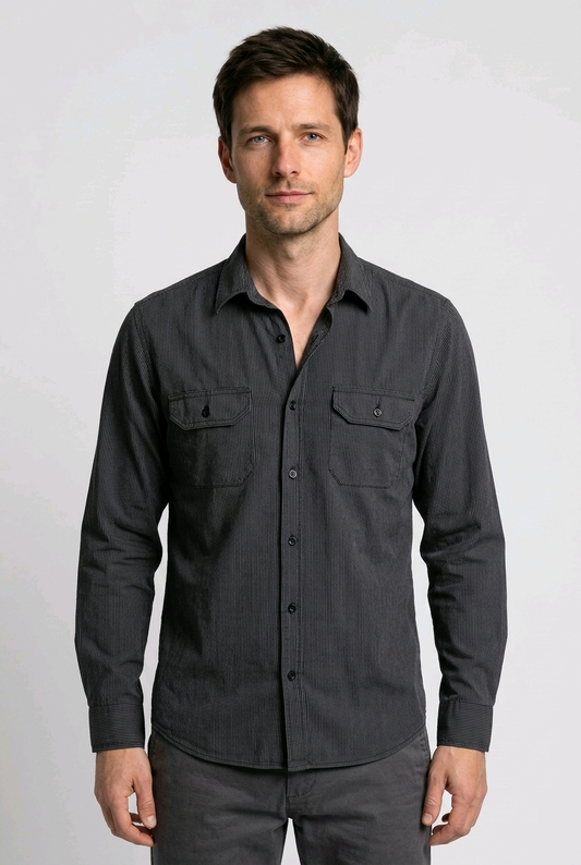 Man wearing a dark gray button-up shirt 
