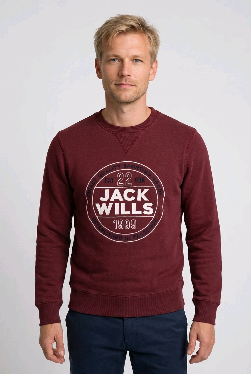 Man wearing a burgundy Jack Will sweatshirt