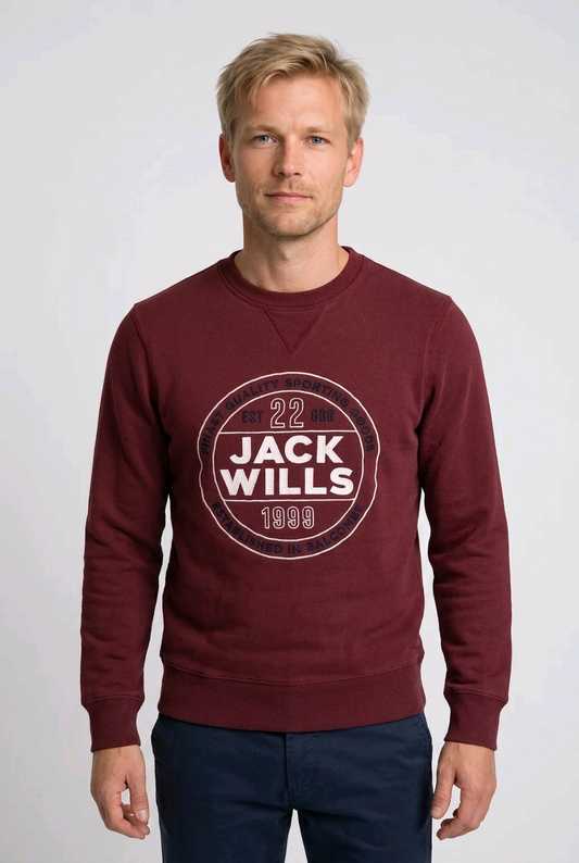 Man wearing a burgundy Jack Will sweatshirt