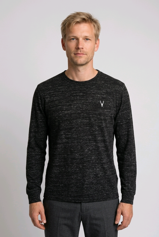 Man wearing a black long-sleeve shirt with a logo