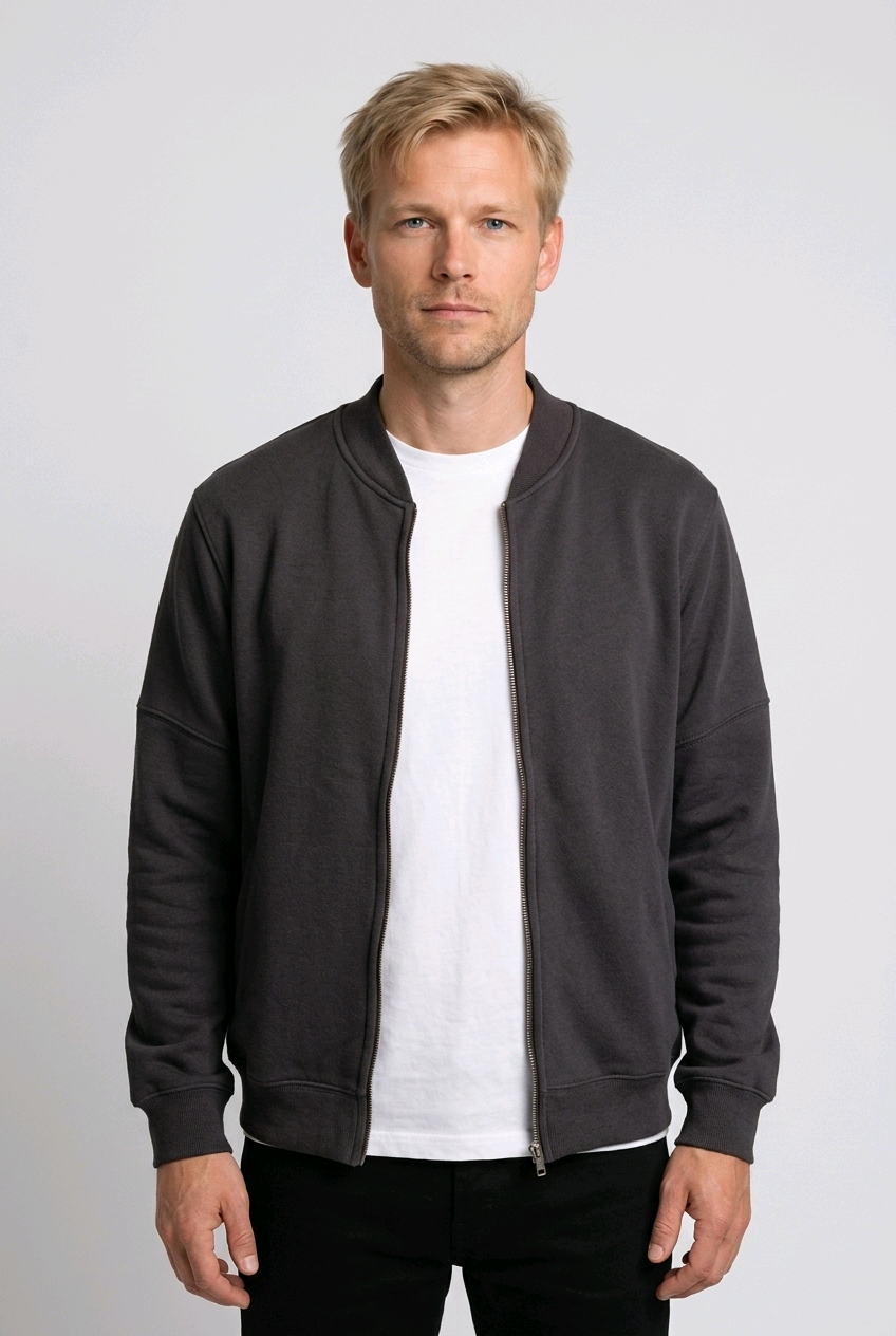 Man wearing a dark gray zip up sweatshirt over a white shirt front view close-up, size L
