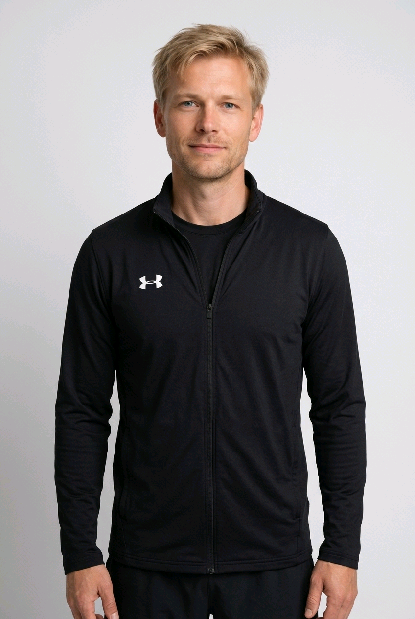 Man wearing Under Armour black jacket 