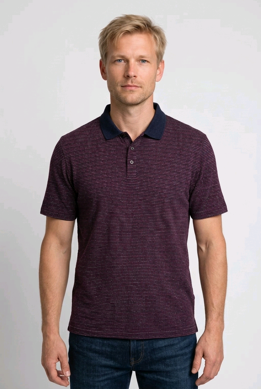 Man wearing a burgundy and white striped polo shirt