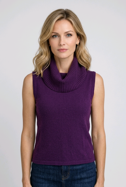 Woman wearing a purple sleeveless jumper with a cowl neck 