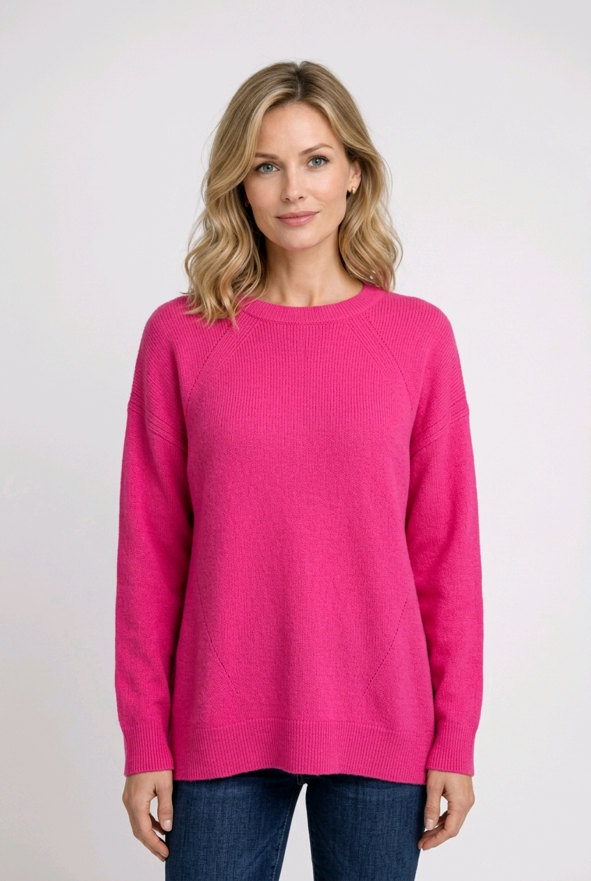 Woman wearing a bright pink sweater 