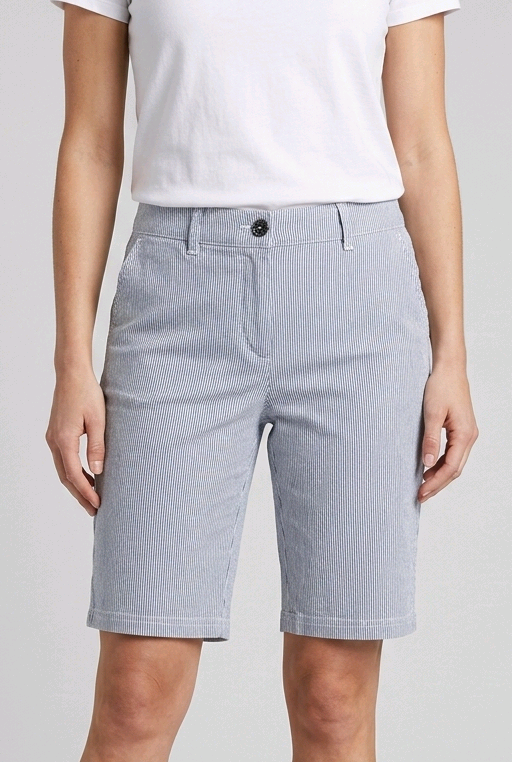 Woman wearing navy & white pinstripe shorts