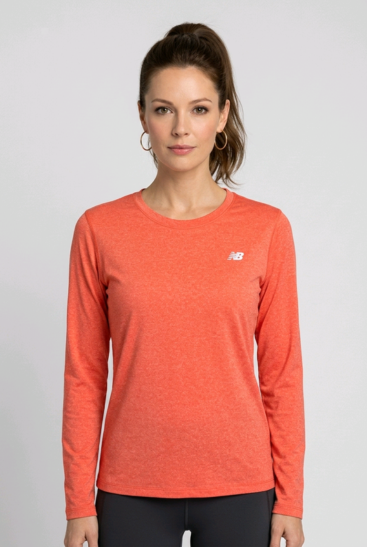 Woman wearing a NB orange long-sleeve top