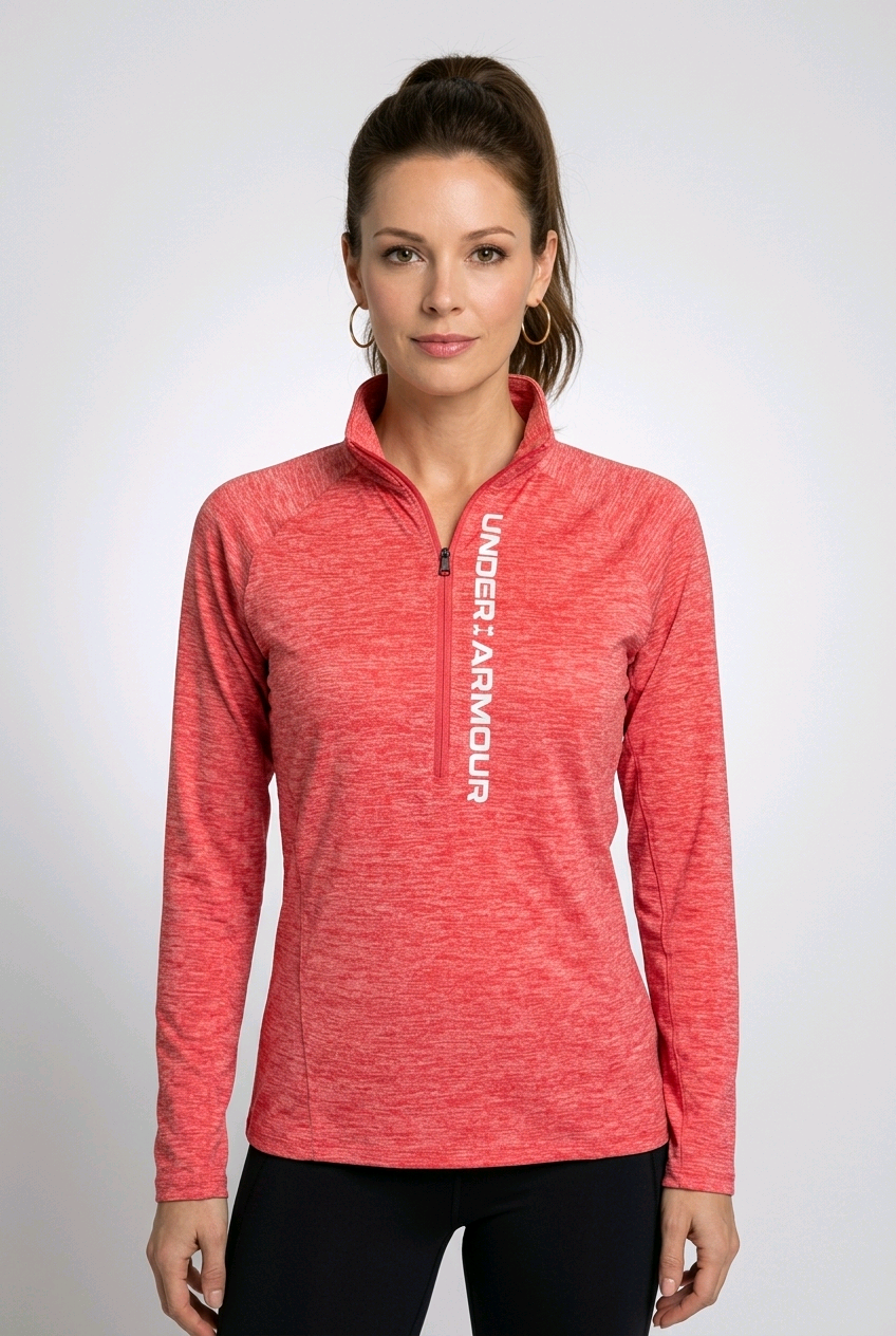 Woman wearing a coral Under Armour long-sleeve top