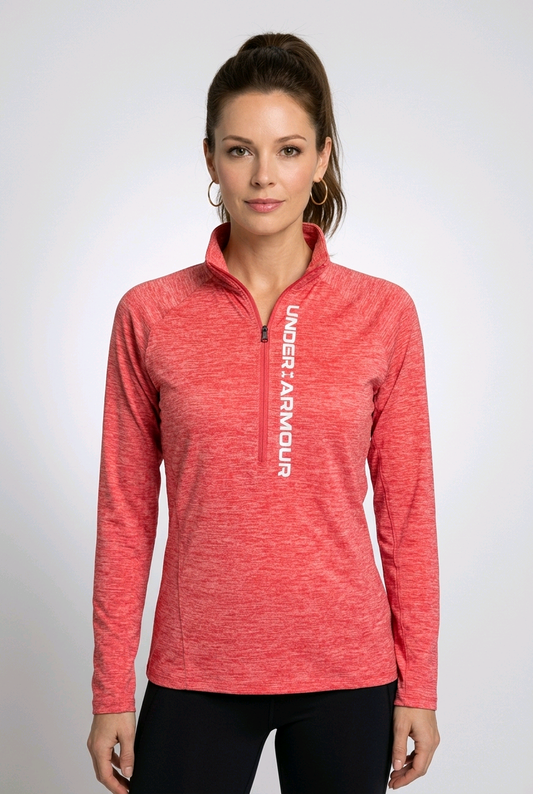 Woman wearing a coral Under Armour long-sleeve top