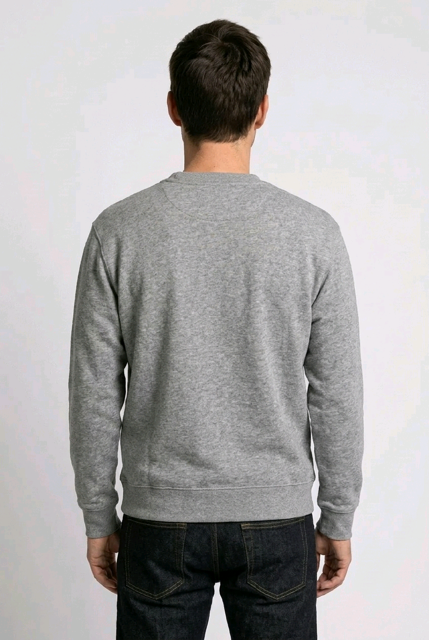 Person wearing a gray sweatshirt from behind on a white background