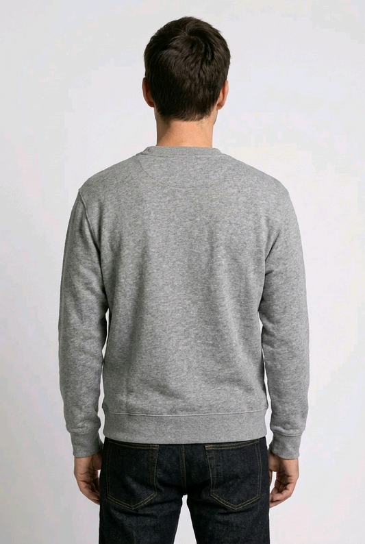 Person wearing a gray sweatshirt from behind on a white background