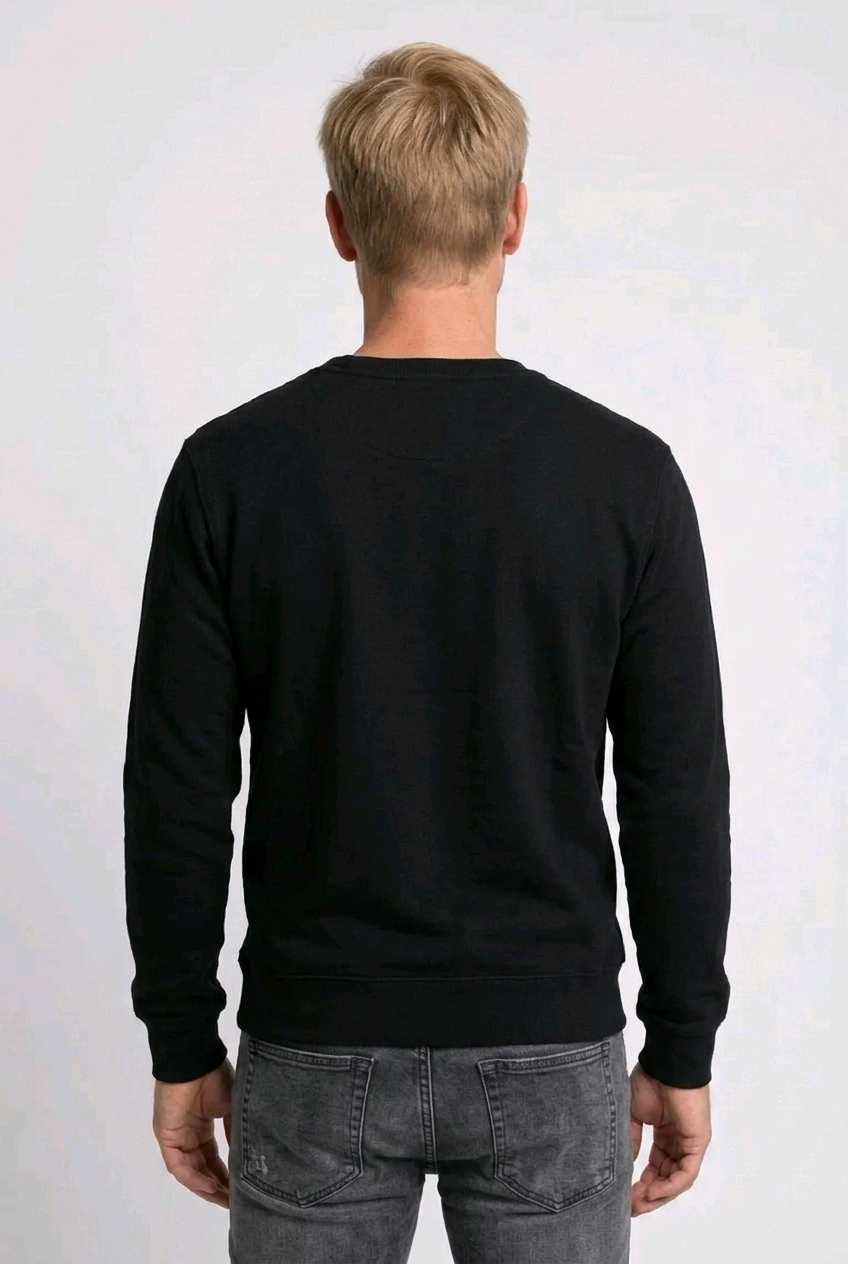 Person wearing a black sweater 