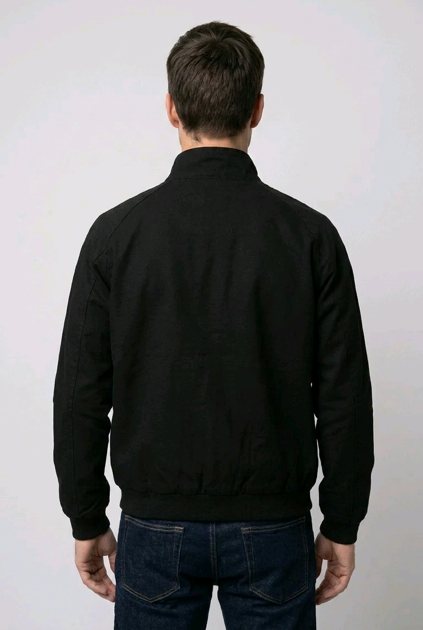 black jacket and blue jeans 