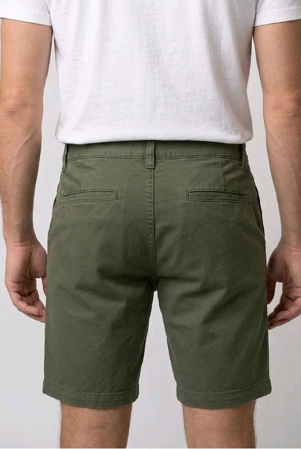  white t-shirt and green shorts back view