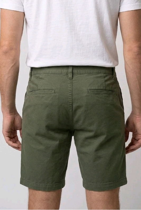  white t-shirt and green shorts back view