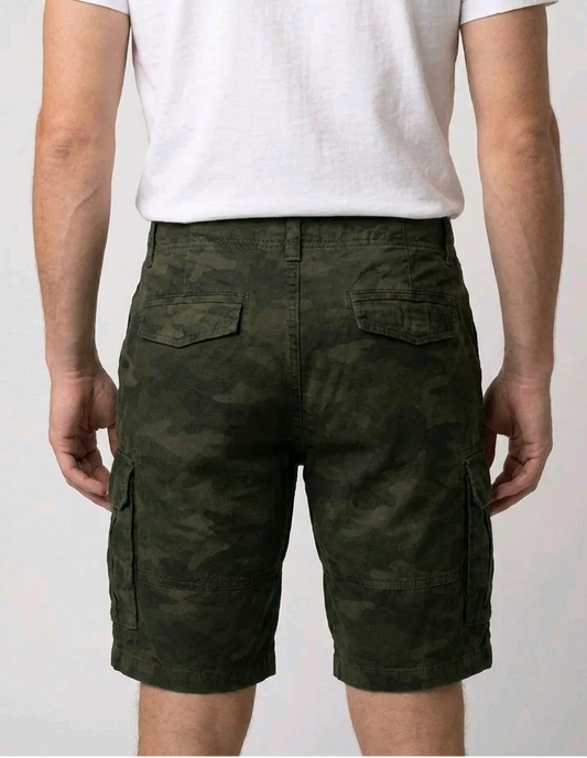 green camouflage cargo shorts and a white t-shirt back view