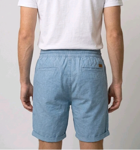  light blue shorts and a white t-shirt 