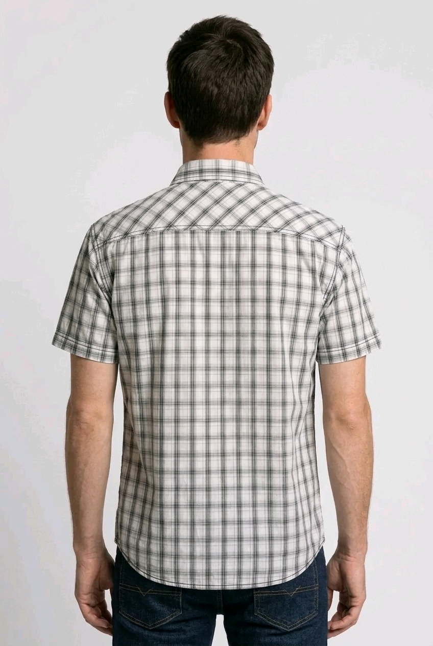 Man wearing a plaid short-sleeve shirt 